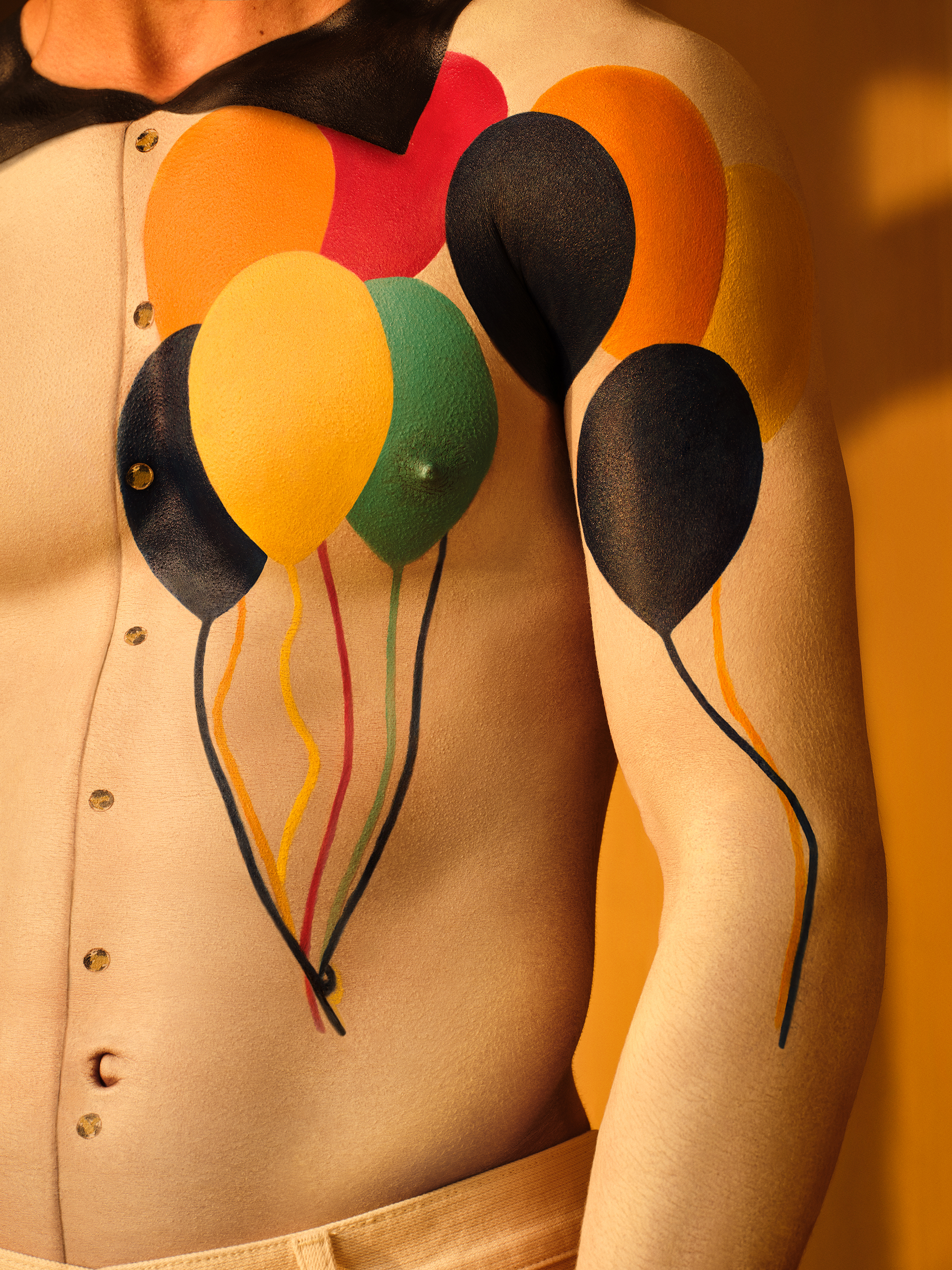 Detail torso shot of body painted with top with blaoon graphics against a warm backdrop